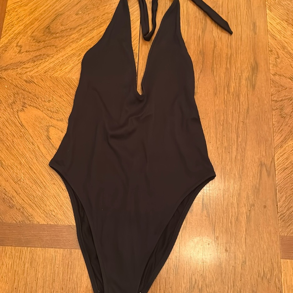 Black one piece, sexy.